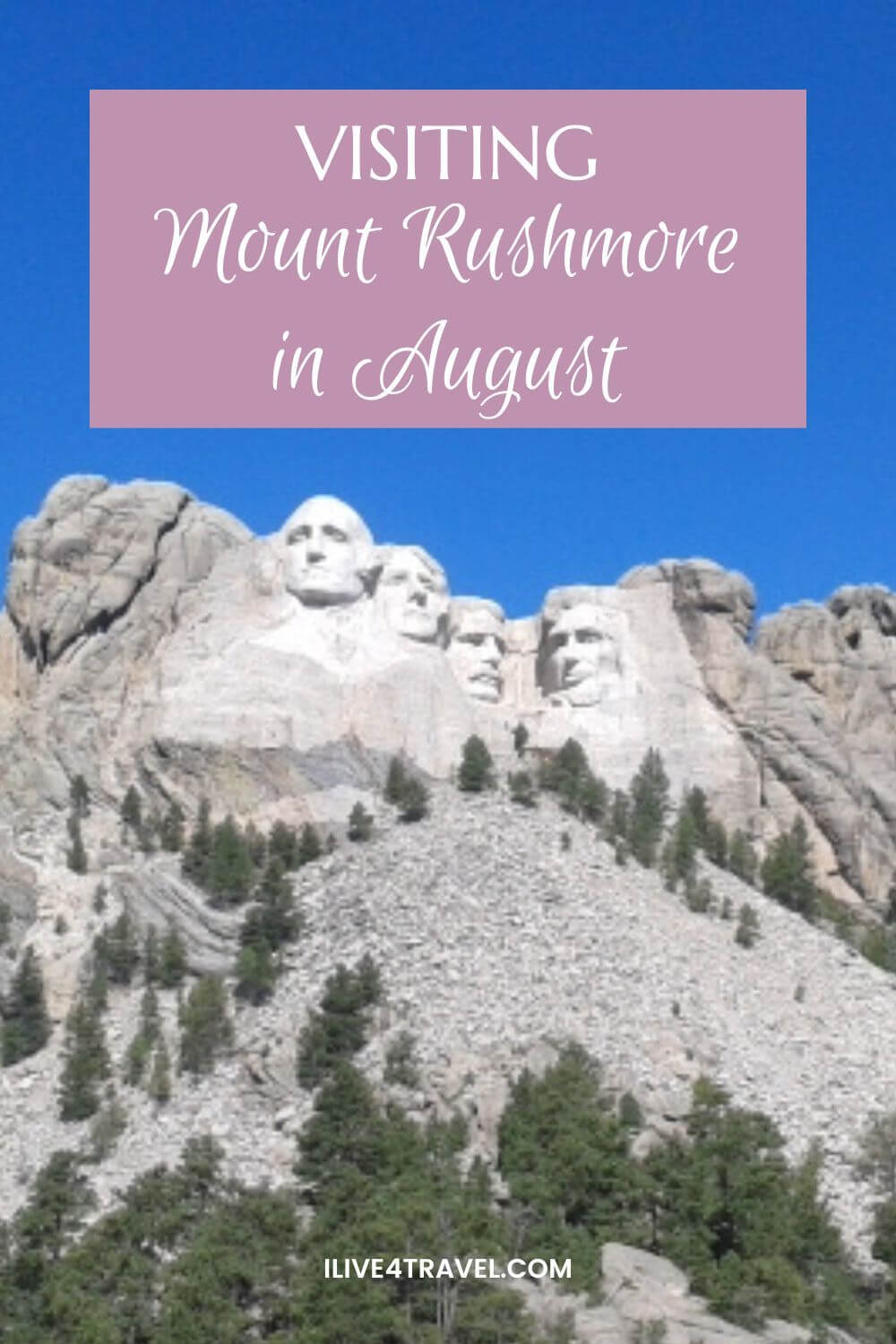 Pinterest pin about Mount Rushmore, showing the famous granite monument with the carved faces of George Washington, Thomas Jefferson, Theodore Roosevelt, and Abraham Lincoln. The massive mountain sculpture is framed by rugged gray rock and green pine trees scattered along the slopes. A bright blue summer sky creates a vivid backdrop, while a pink banner at the top reads “Visiting Mount Rushmore in August”