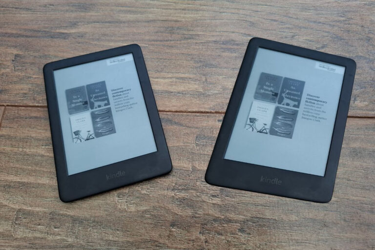 a kindle and a kindle paperwhite on a wooden floor