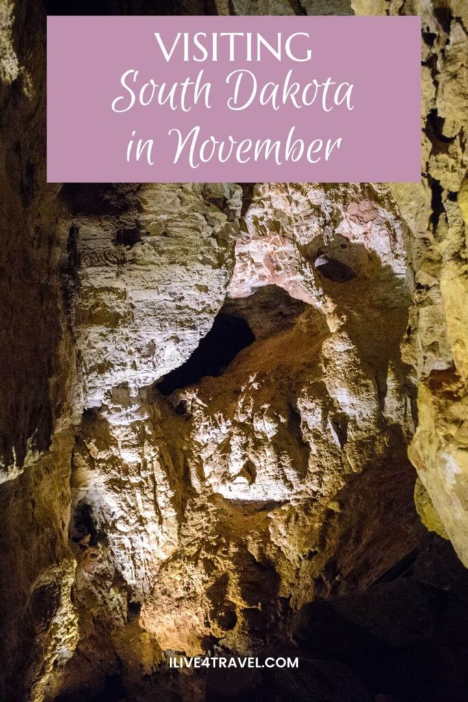 a pinterest pin about visiting south dakota in november, showing the inside of a cave